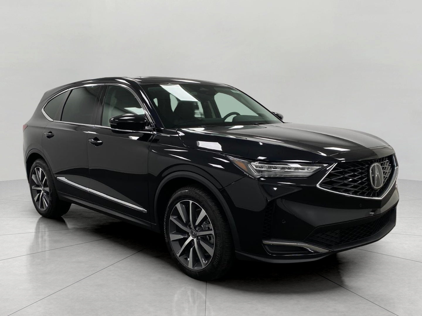 2026 Acura MDX SH-AWD w/Technology Package in Majestic Black Pearl — front three-quarter view