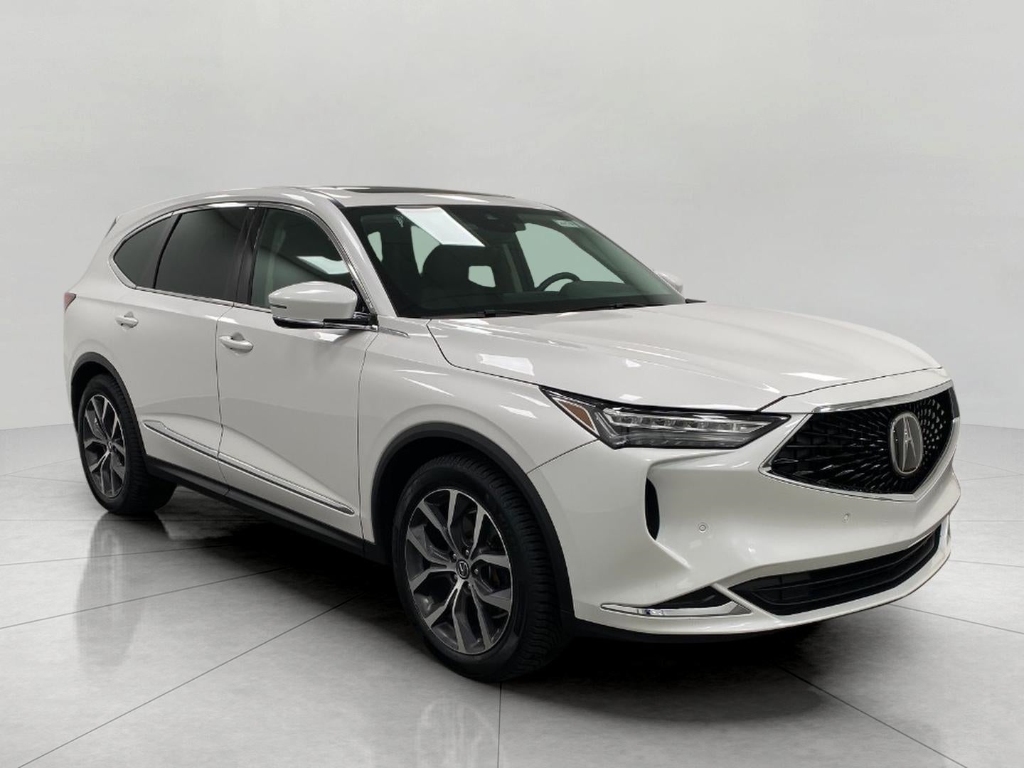 2023 Acura MDX SH-AWD w/Technology Package in Platinum White Pearl — front three-quarter view