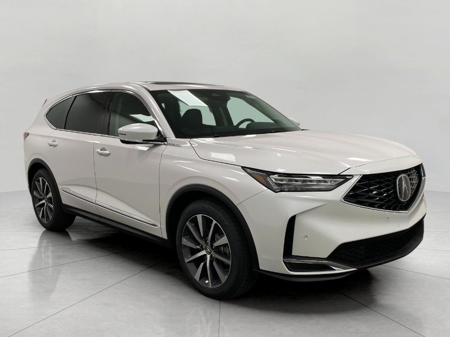 2026 Acura MDX SH-AWD w/Technology Package in Platinum White Pearl — front three-quarter view