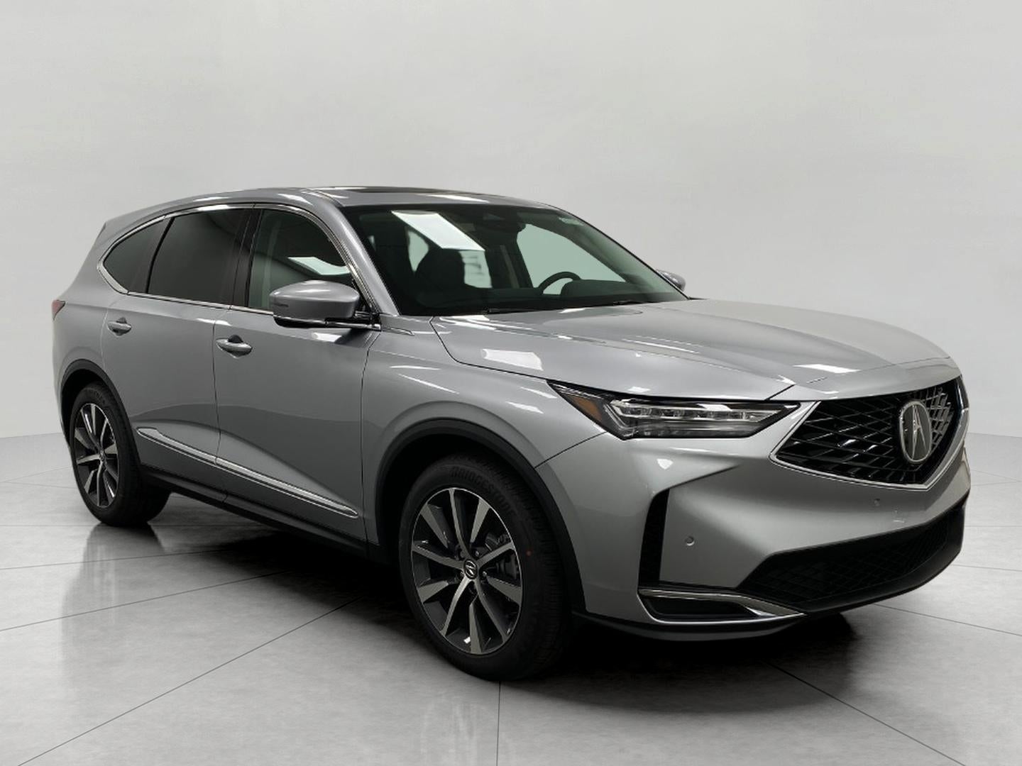 2026 Acura MDX SH-AWD w/Technology Package in Solar Silver Metallic — front three-quarter view