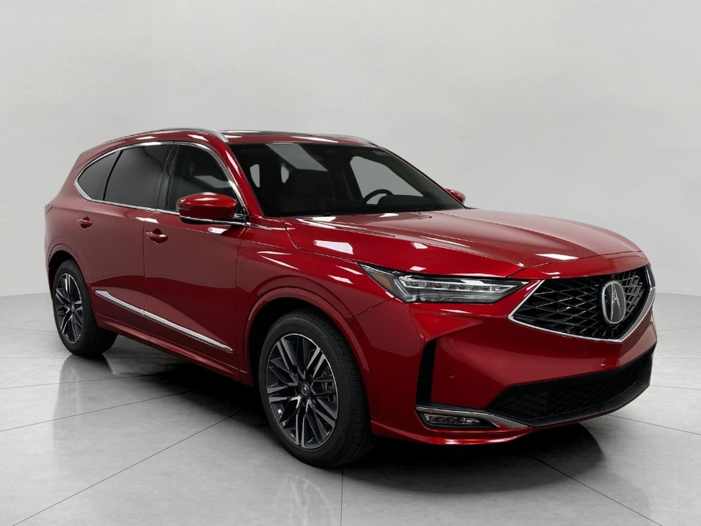 2026 Acura MDX SH-AWD w/Advance Package in Performance Red Pearl — front three-quarter view