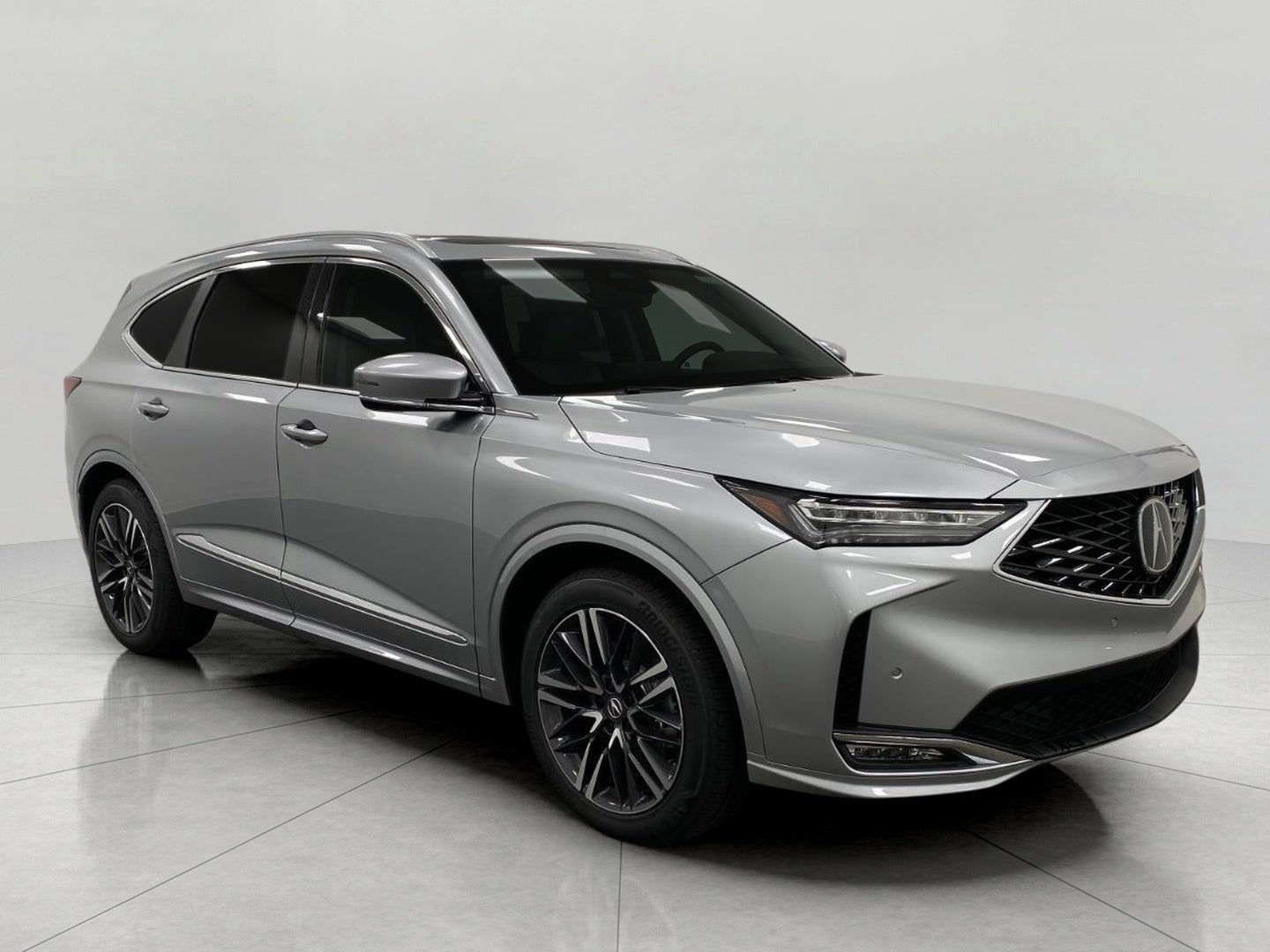 2026 Acura MDX SH-AWD w/Advance Package in Solar Silver Metallic — front three-quarter view